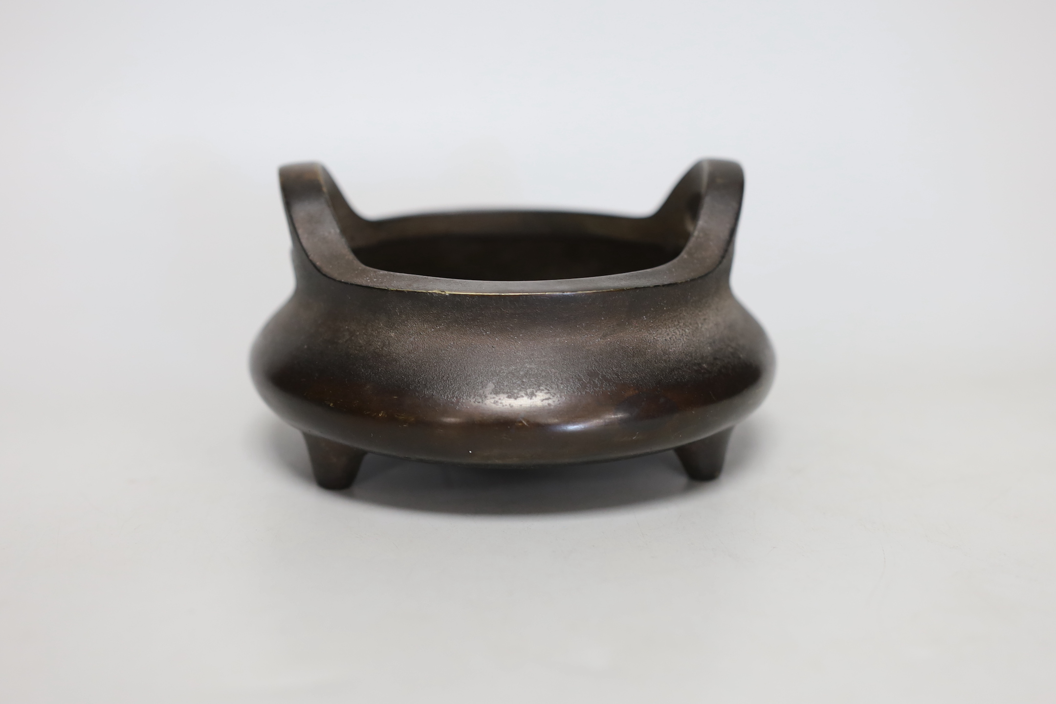 A Chinese bronze censer, ding, 8cm tall